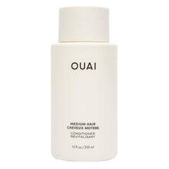 OUAI botella frontal mostrando diseño y tamaño para identificar el acondicionador