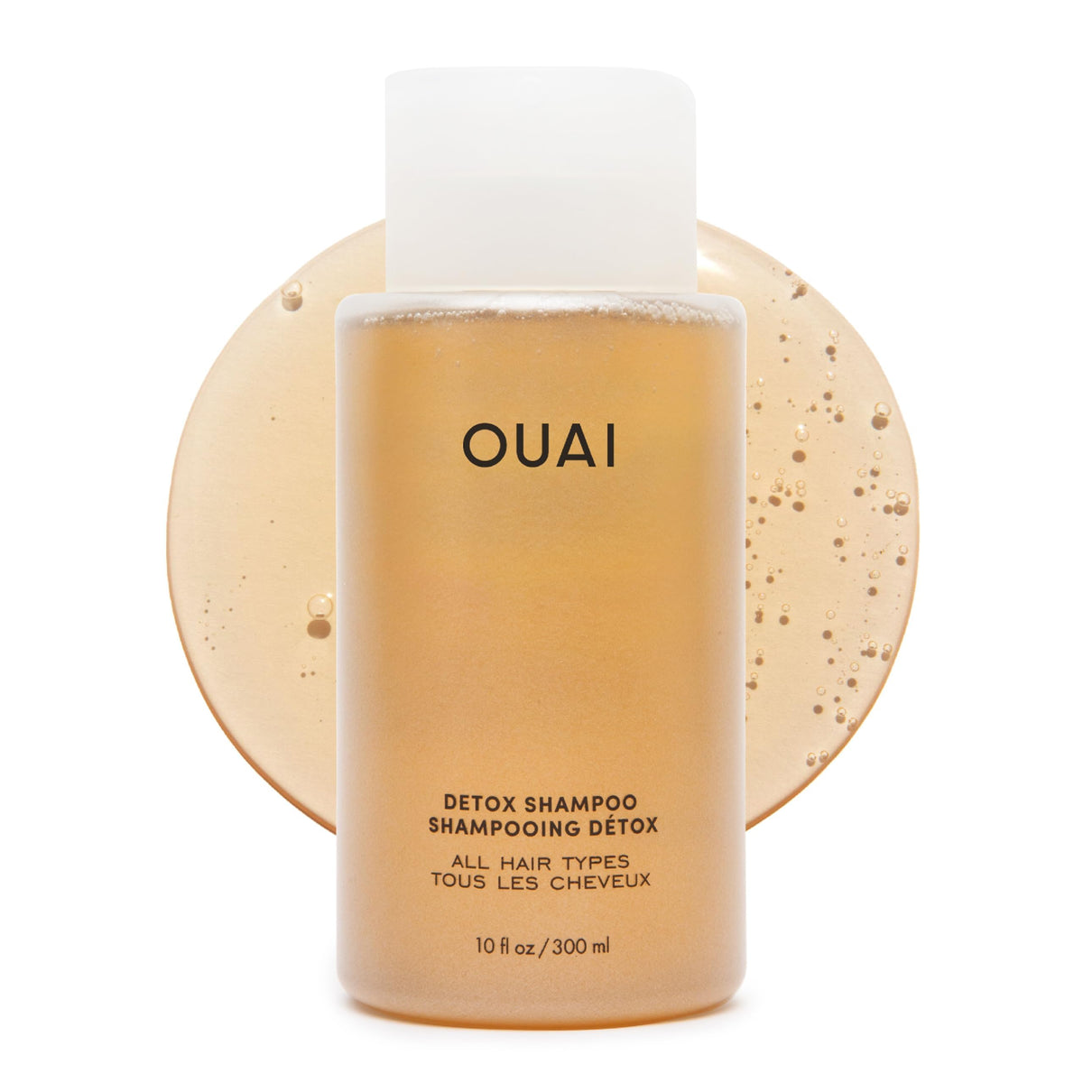 OUAI frasco frontal mostrando diseño y claridad para limpieza profunda