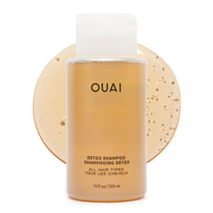 OUAI frasco frontal mostrando diseño y claridad para limpieza profunda