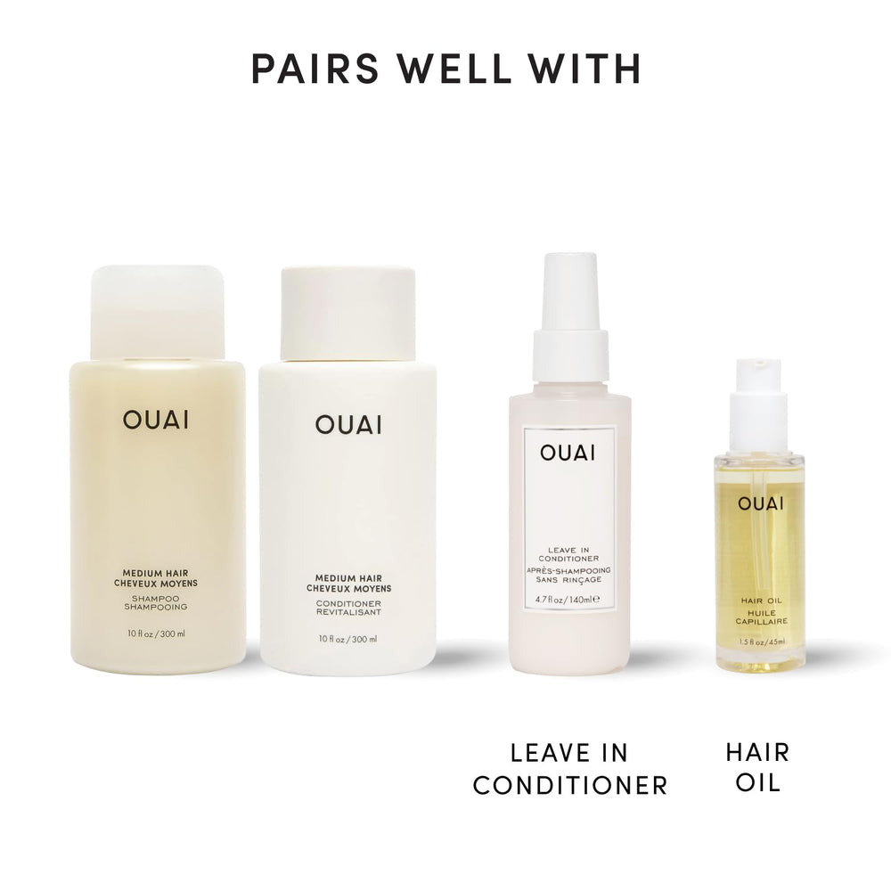 OUAI manos tocando puntas, acondicionamiento que reduce rotura y suaviza