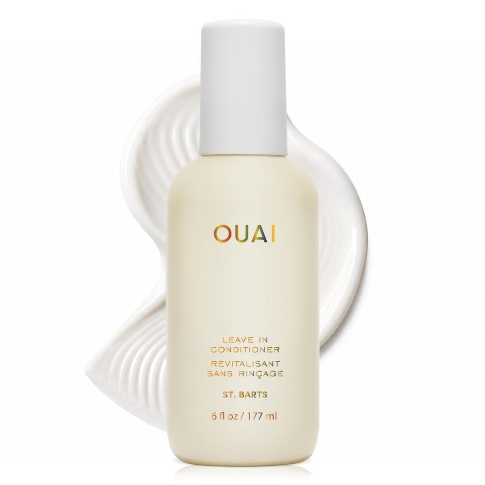 OUAI botella frontal con fragancia St. Barts mostrando el envase elegante y beneficios