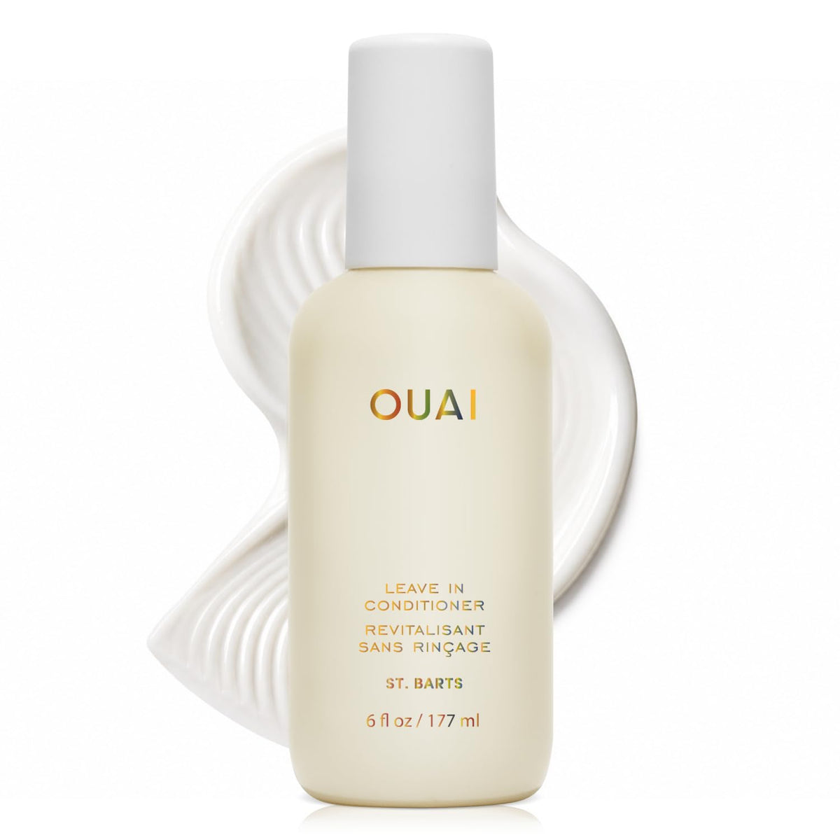 OUAI botella frontal con fragancia St. Barts mostrando el envase elegante y beneficios