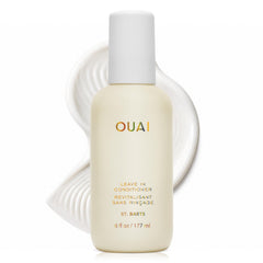 OUAI botella frontal con fragancia St. Barts mostrando el envase elegante y beneficios