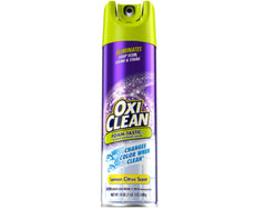 OxiClean espuma espesa sobre una mano mostrando textura adherente y eficacia