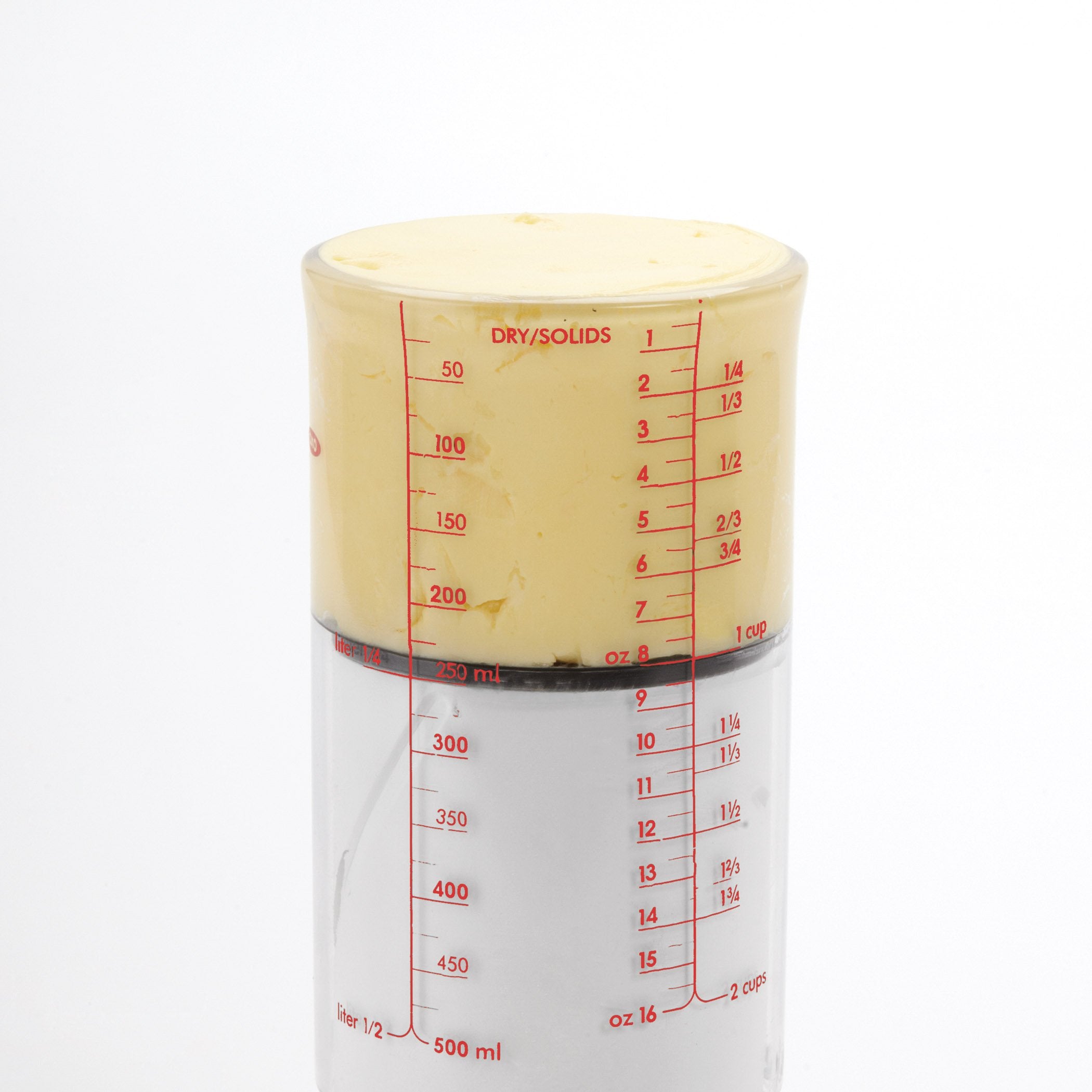 OXO vaso en rejilla de lavavajillas señalando limpieza fácil
