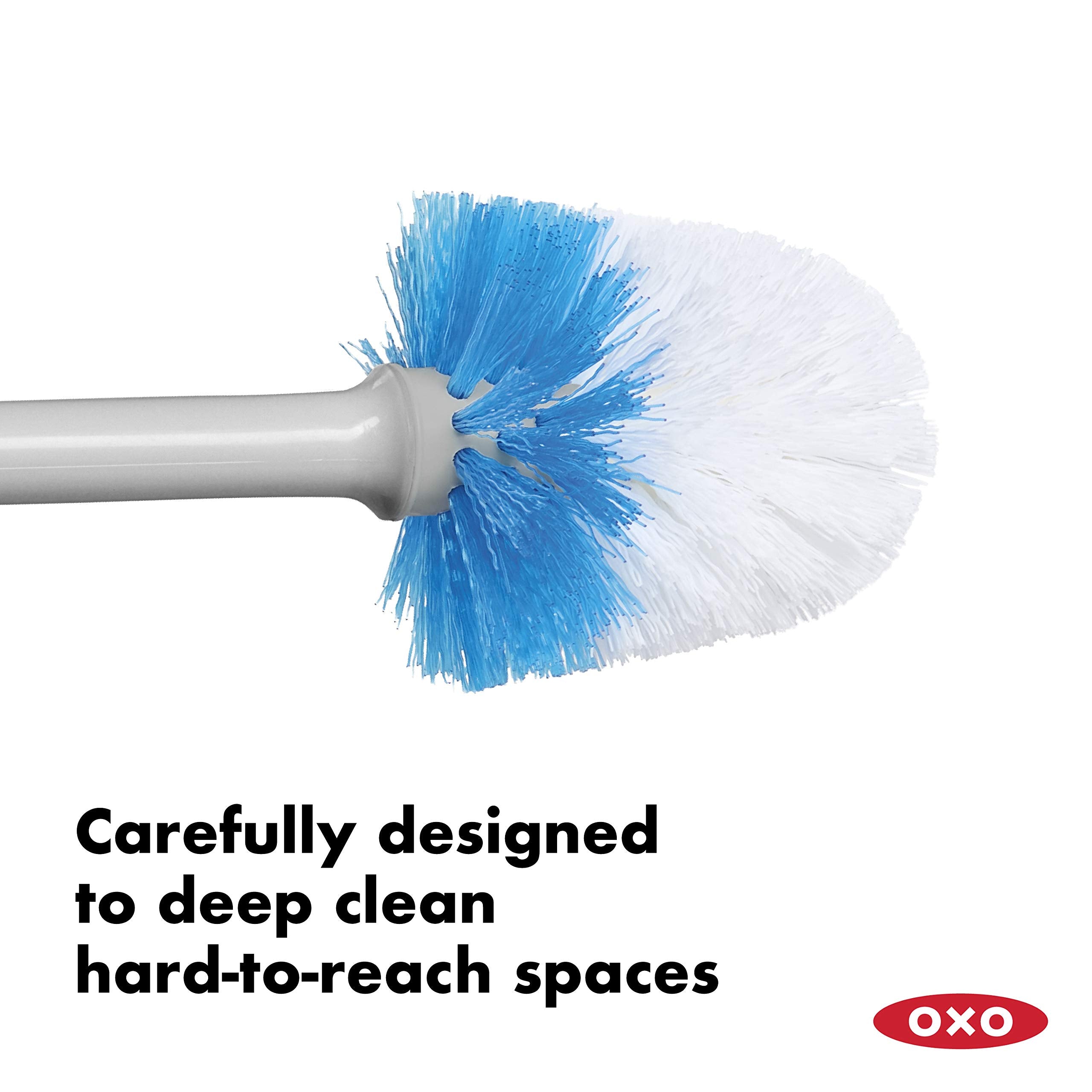 OXO comparación de tamaño junto a un retrete para visualizar escala compacta