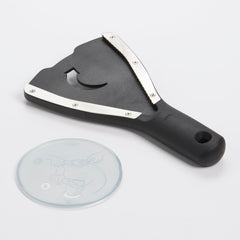 OXO Good Grips detalle de dientes de acero inoxidable para agarre seguro