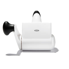OXO rallador rotatorio vista frontal recoge y conserva queso