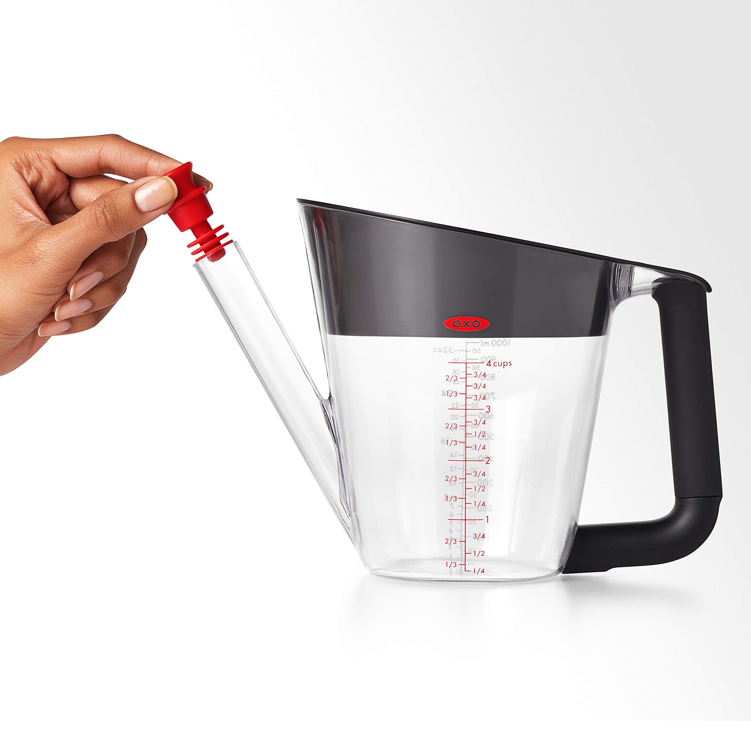 OXO junto a una taza para comparar tamaño 4 tazas, útil para porciones familiares