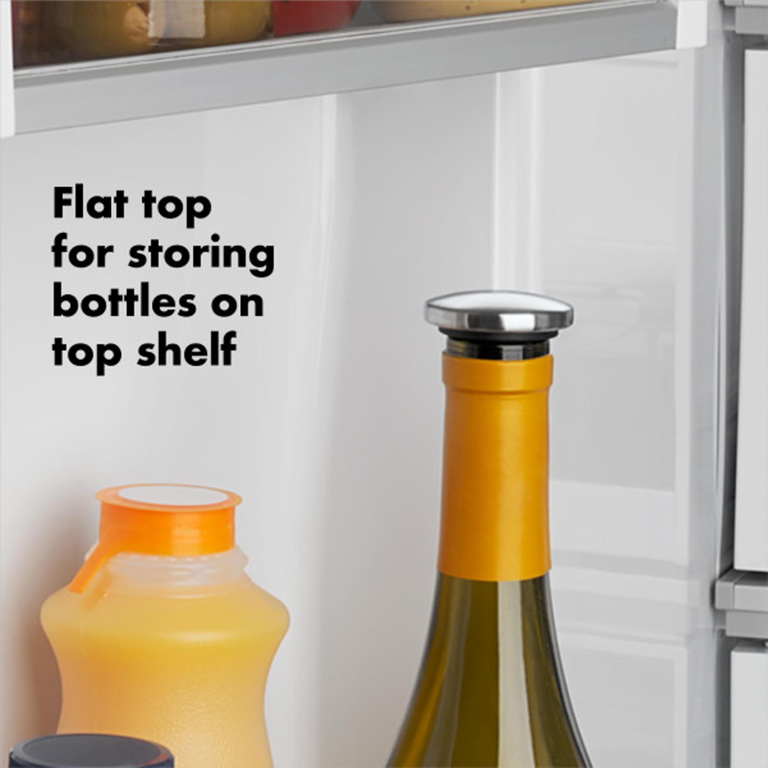 OXO SteeL junto a regla para comparar tamaño y escala