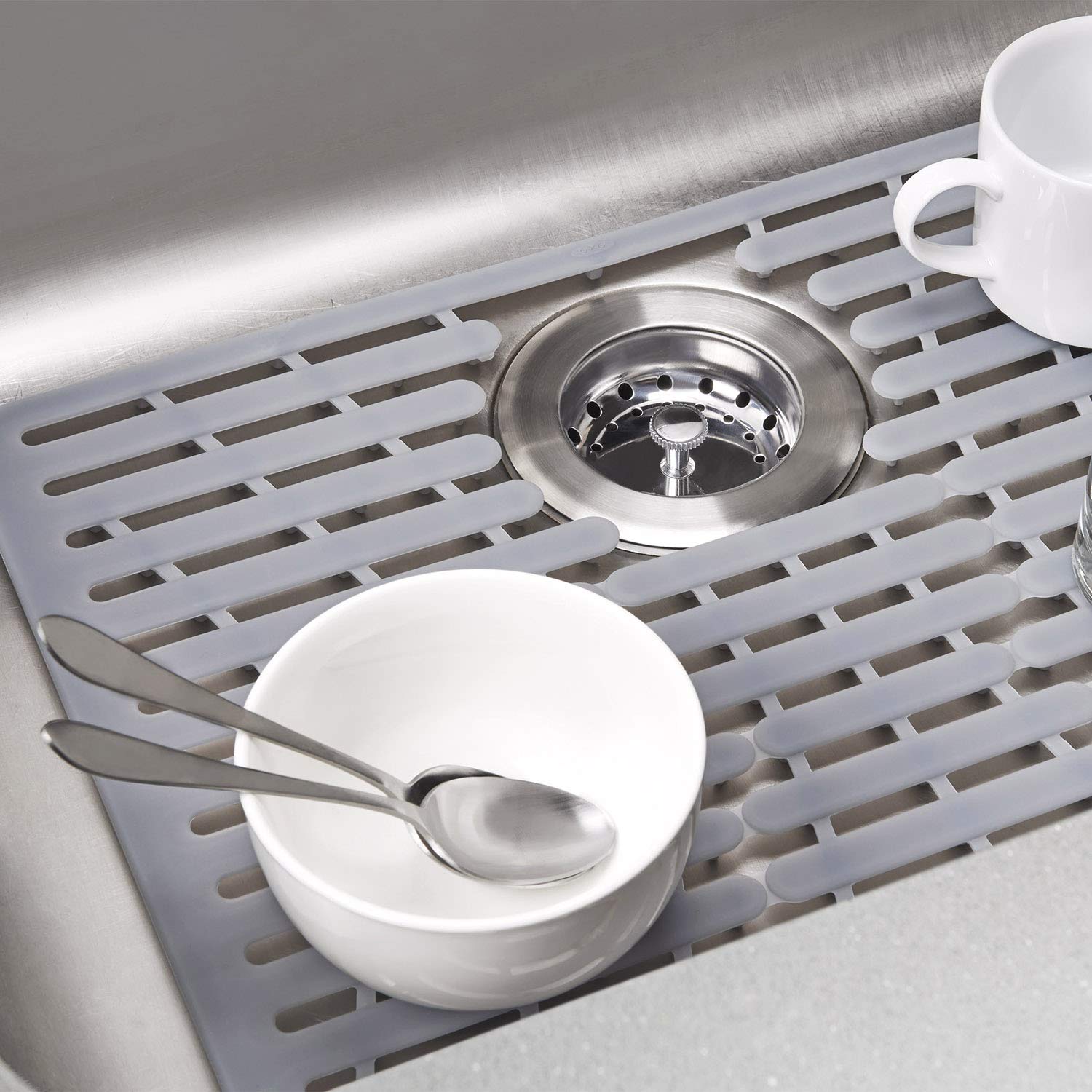 OXO colocación de una olla caliente sobre la alfombrilla protegida