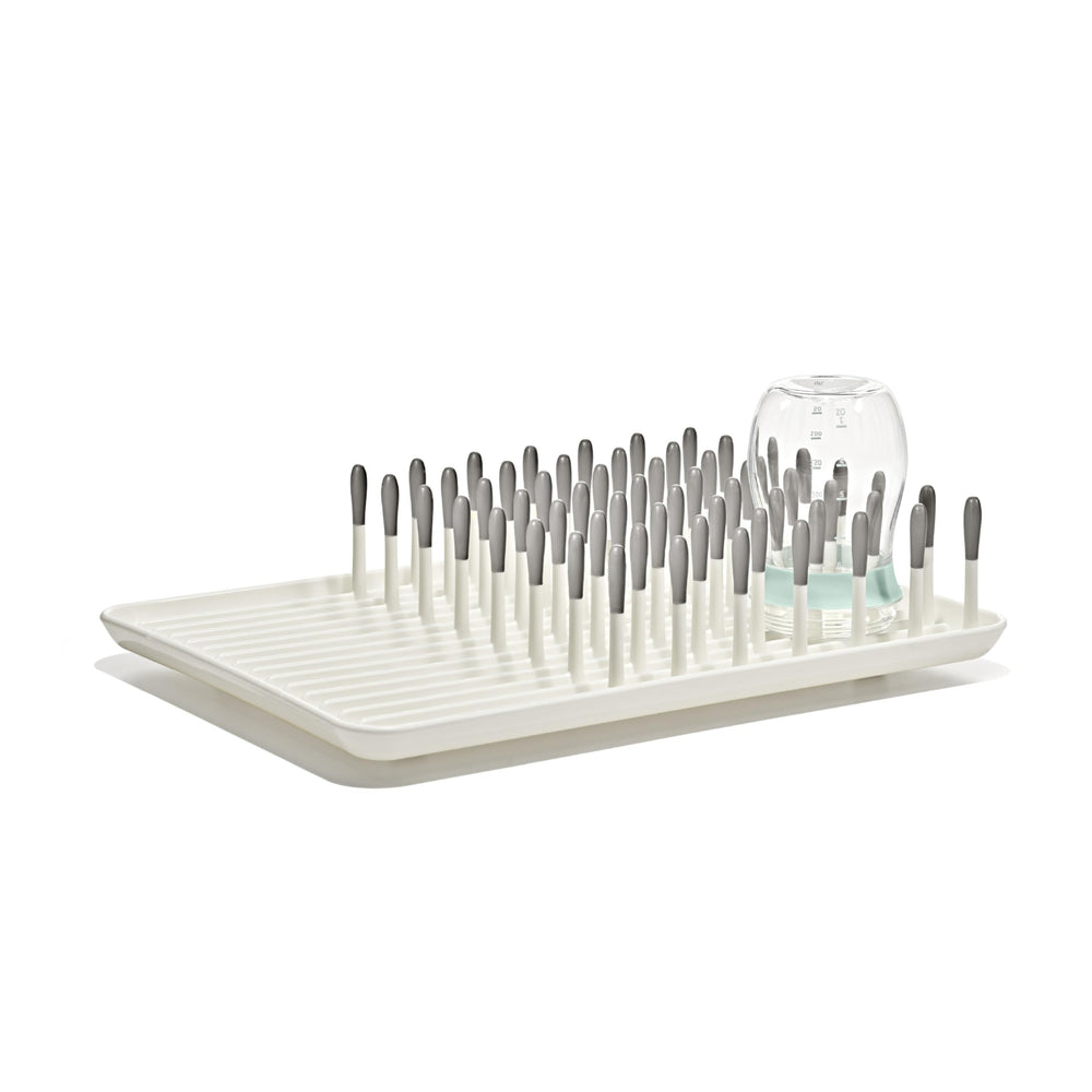 OXO Tot front view of drying rack showing capacity and tidy organization