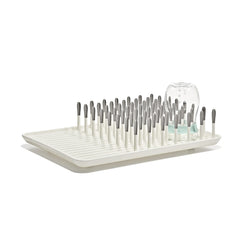 OXO Tot front view of drying rack showing capacity and tidy organization