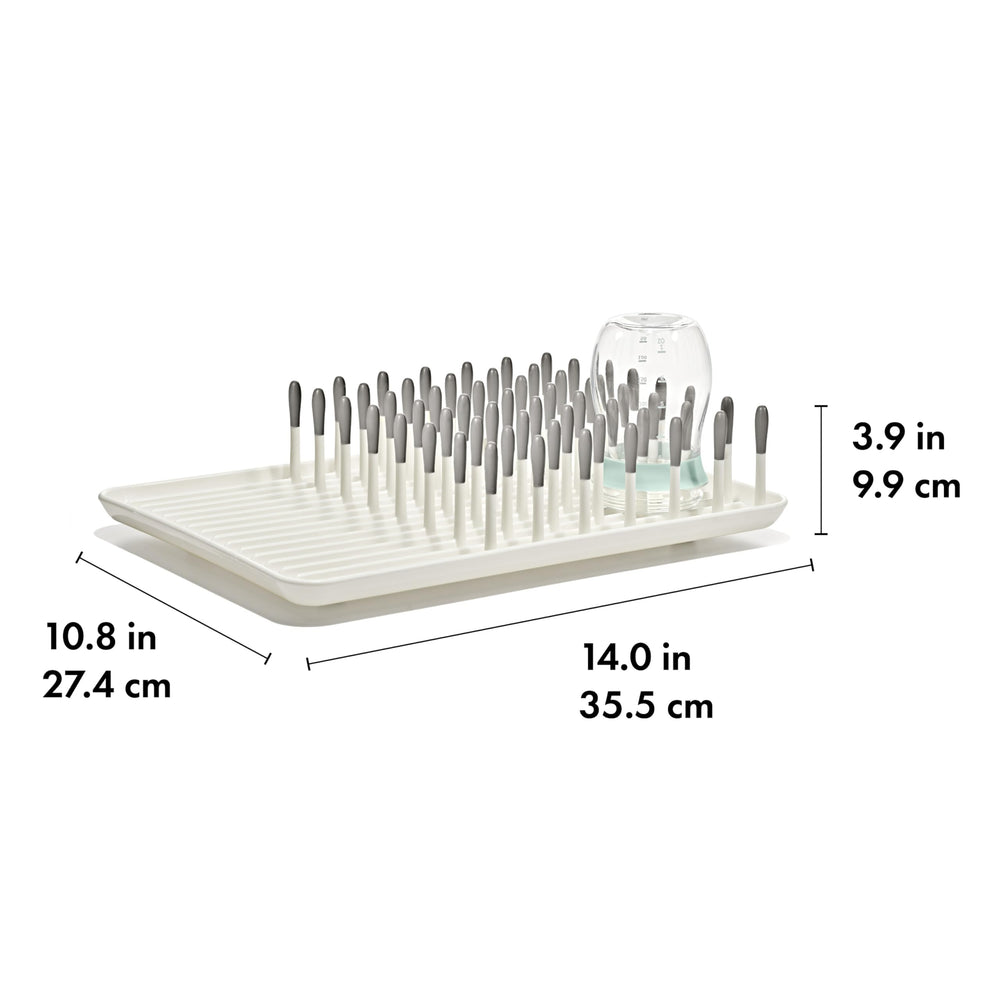 OXO Tot rack next to sink showing compact size for small countertop spaces