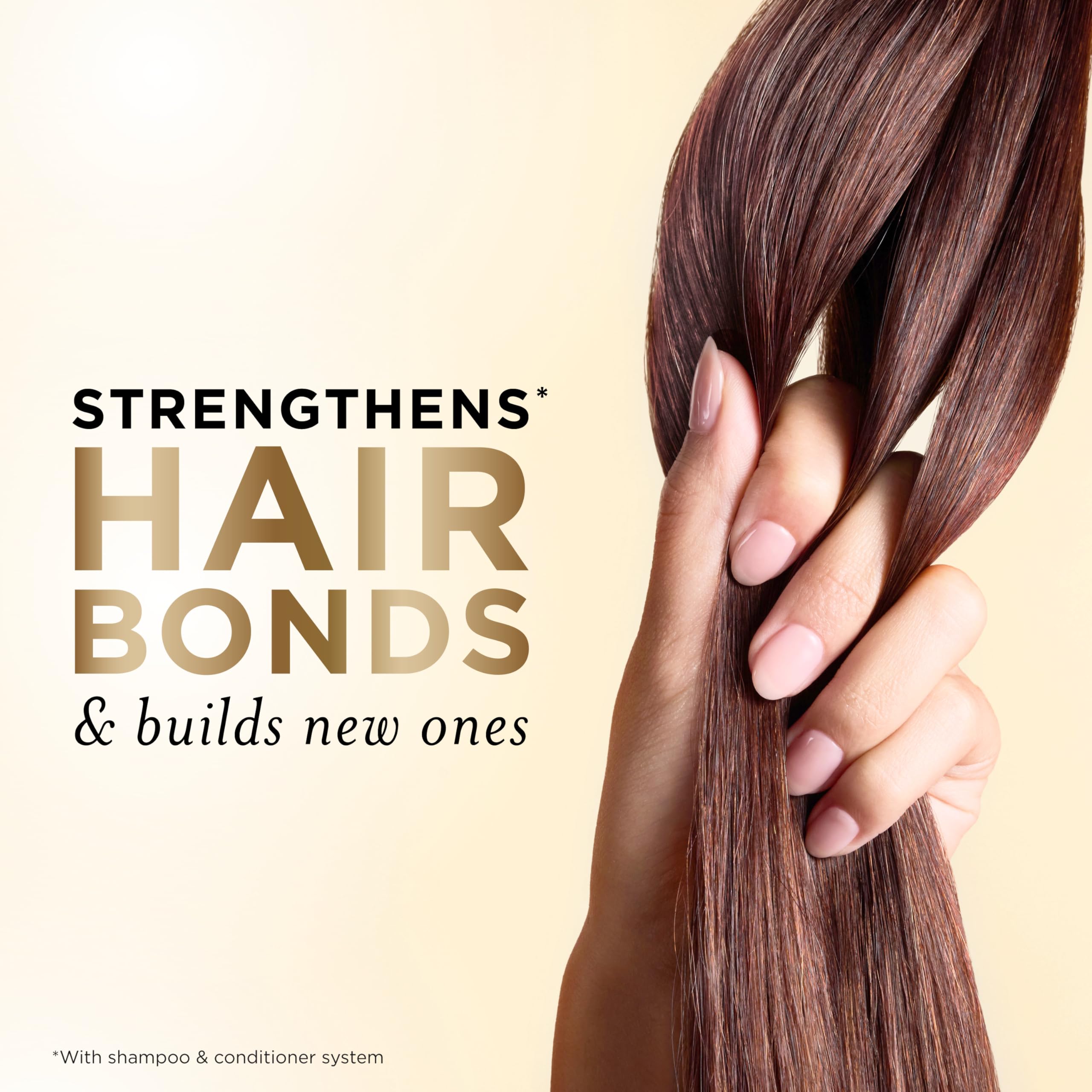 Detalle de la etiqueta Pantene con ingredientes Pro-V y beneficios antioxidantes visibles