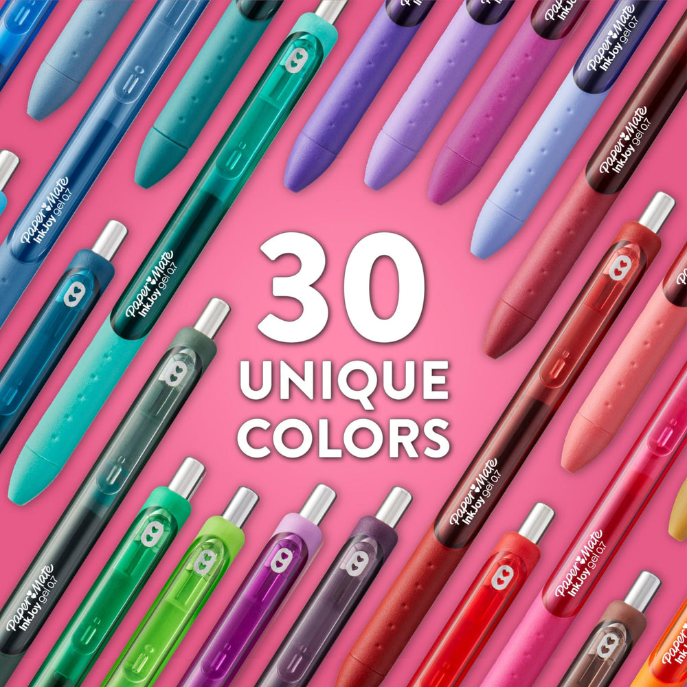 Paper Mate comparación de tamaño junto a un cuaderno para escala