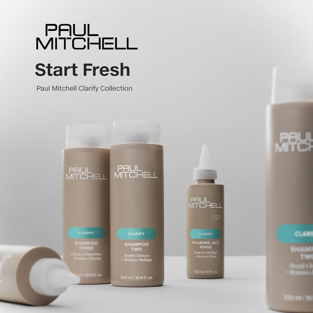 Paul Mitchell champú Two junto a regla para comparar tamaño y cantidad útil