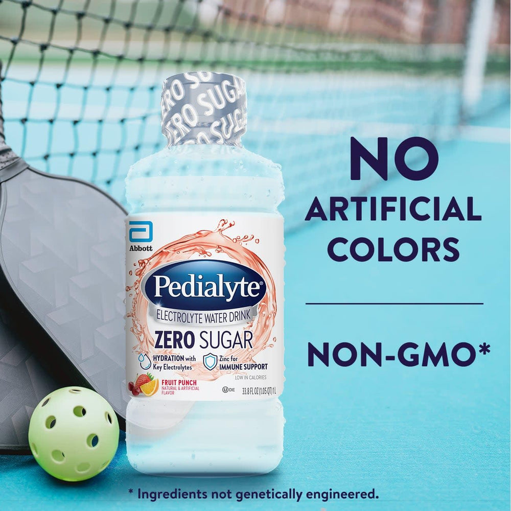 Pedialyte bottle held in hand for scale, demonstrates portable adult-sized hydration