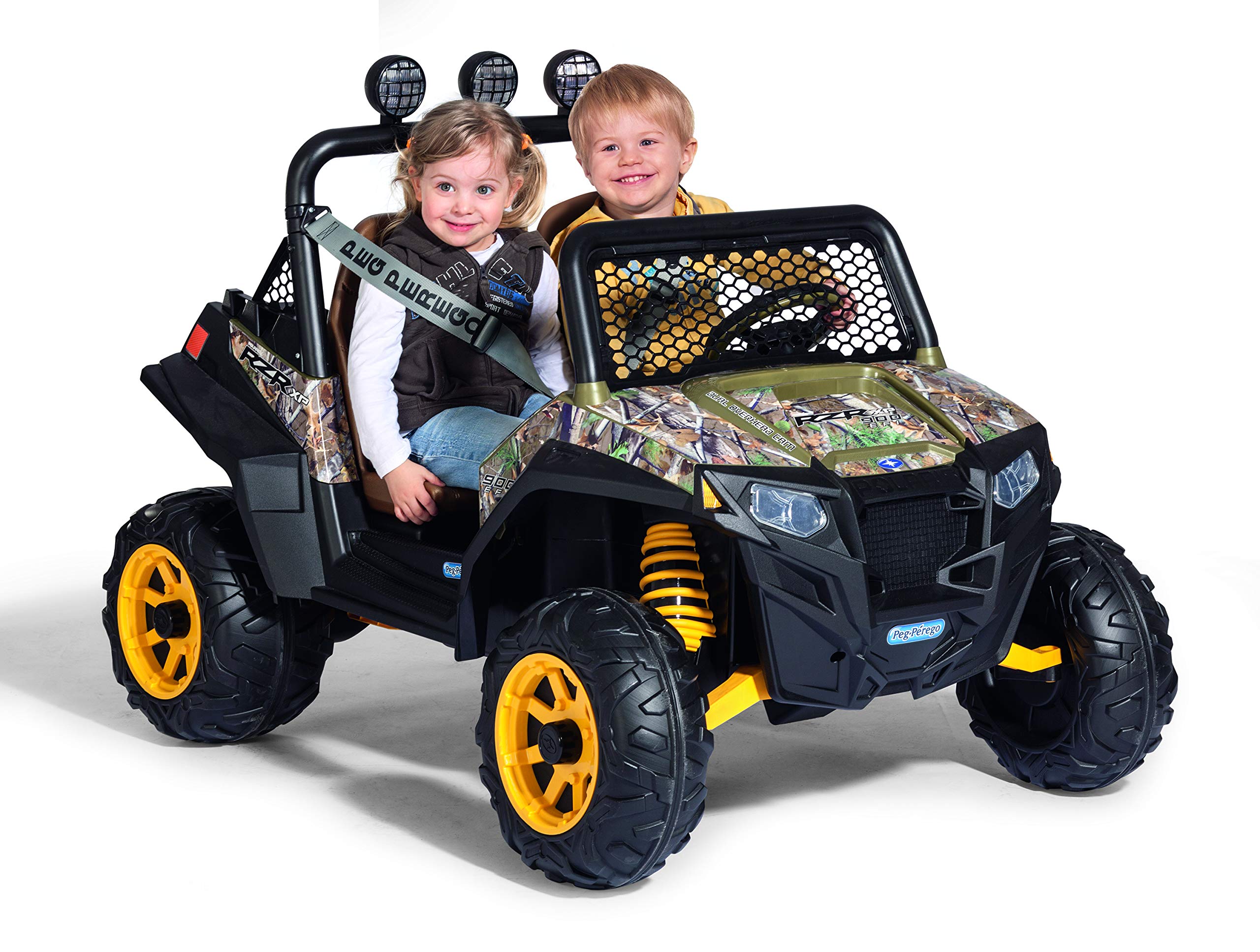 Peg Perego batería junto a mano para comparar escala y facilidad de manejo
