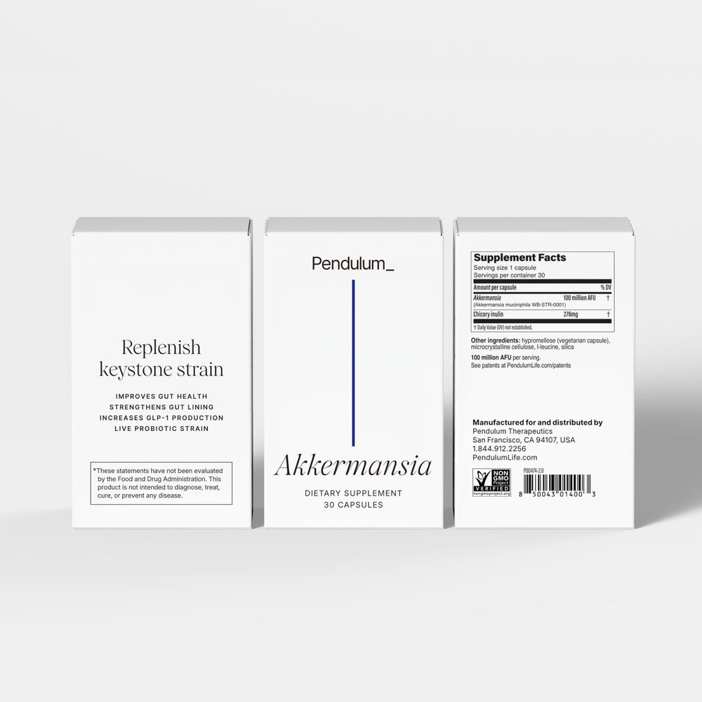 Pendulum frasco junto a mano para comparar tamaño y dosis diaria