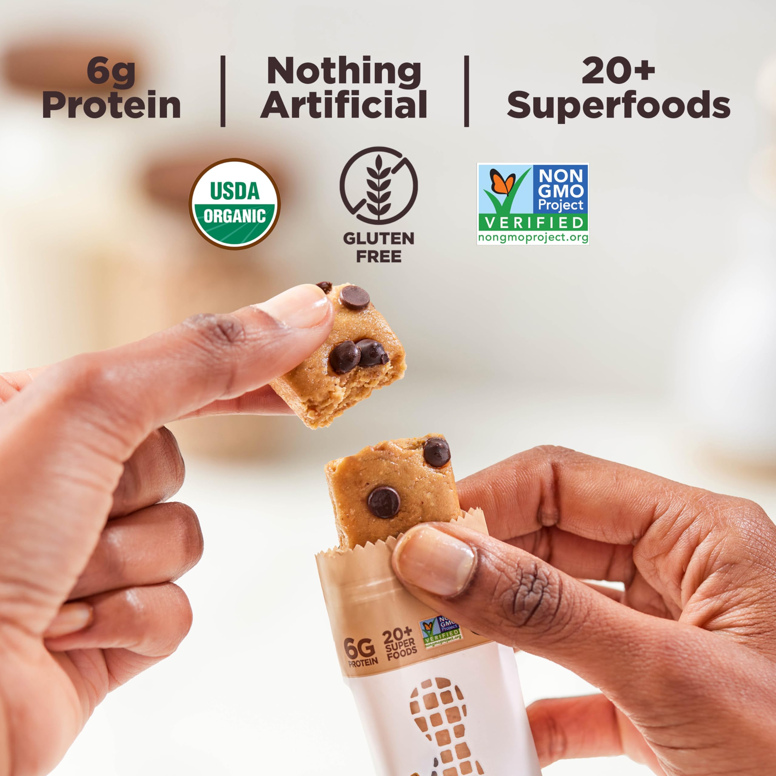 Perfect Bar ingredients spread featuring peanuts, dark chocolate and superfood benefits