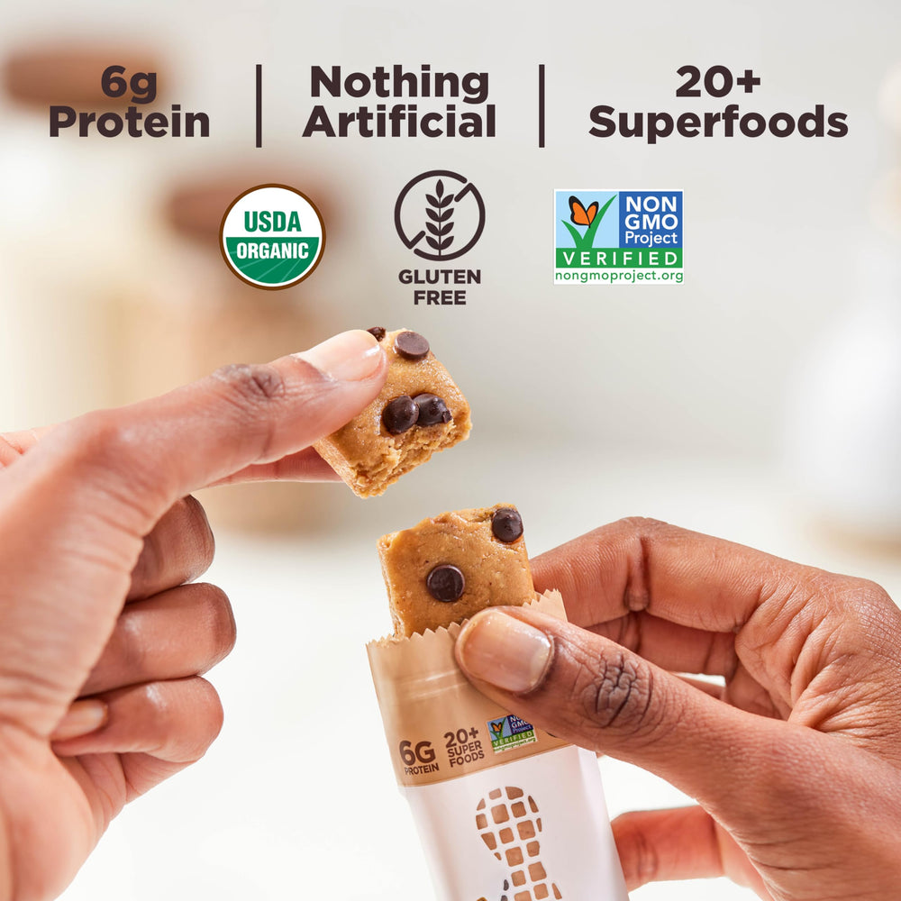 Perfect Bar ingredients spread featuring peanuts, dark chocolate and superfood benefits