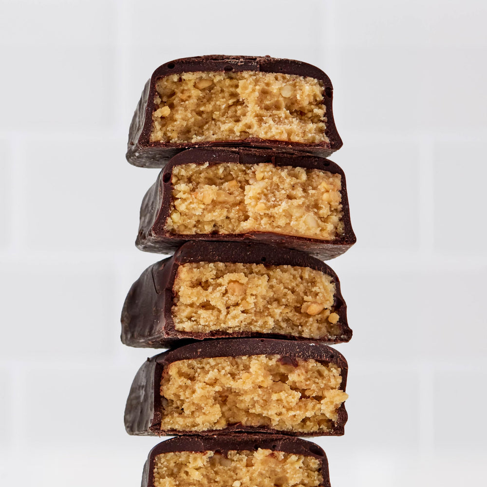 Perfect Bar mini single unwrapped bar with chocolate and peanut butter visible, appeals to taste