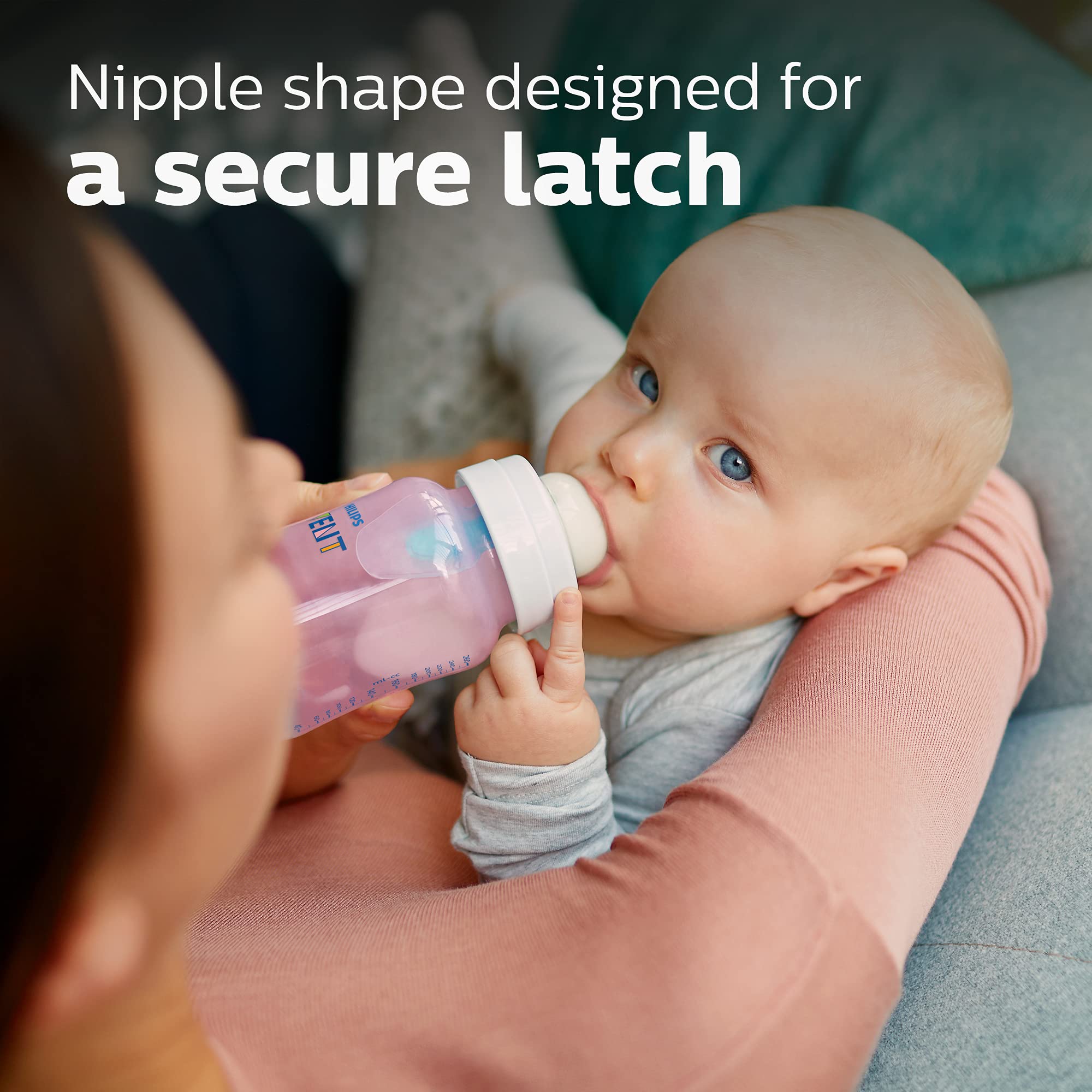 Philips Avent bottle in hand illustrates 9oz scale and easy grip for caregivers
