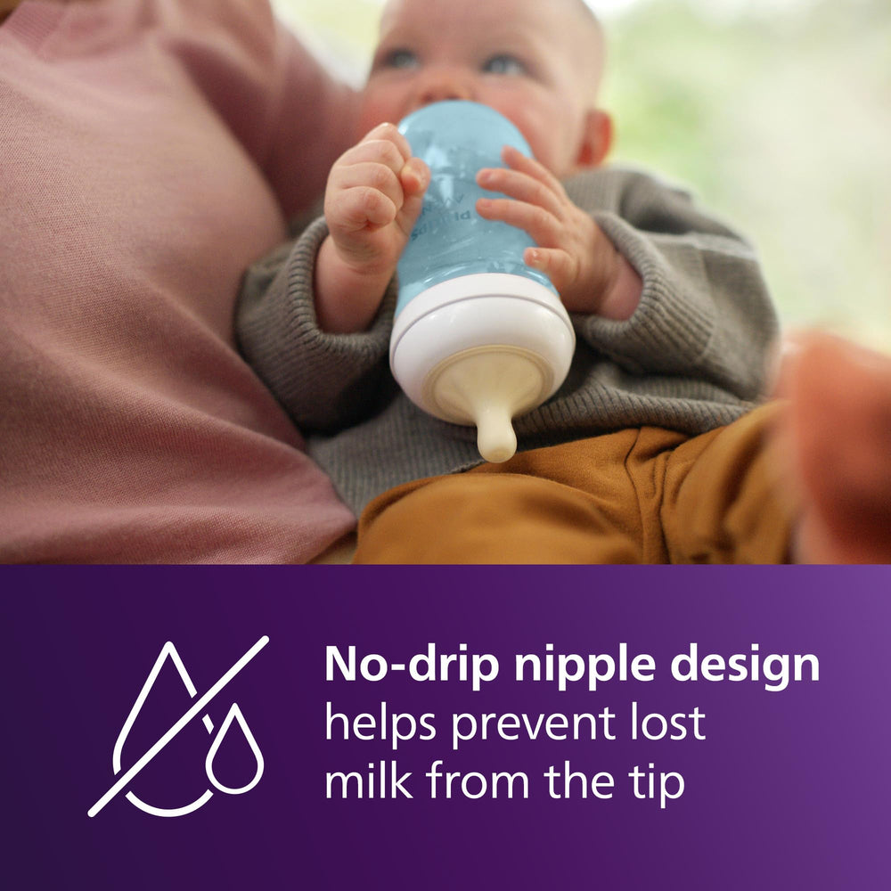 Philips Avent manos de bebé agarrando biberón para aprender a sostenerlo