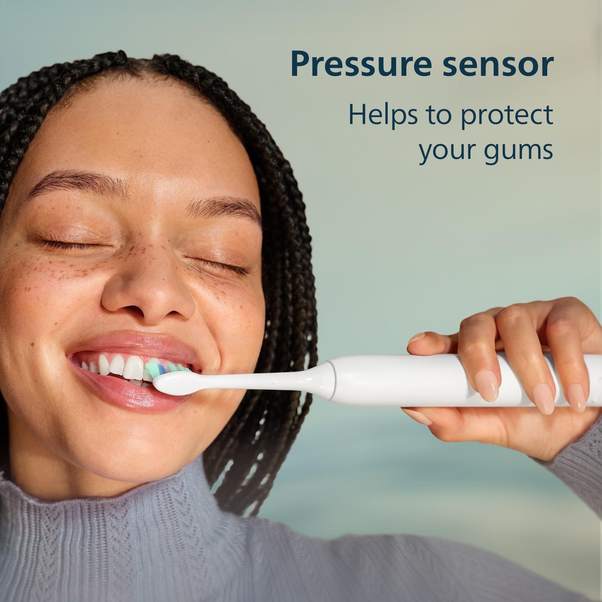 Philips Sonicare cepillo en uso mostrando limpieza precisa entre dientes en rutina diaria