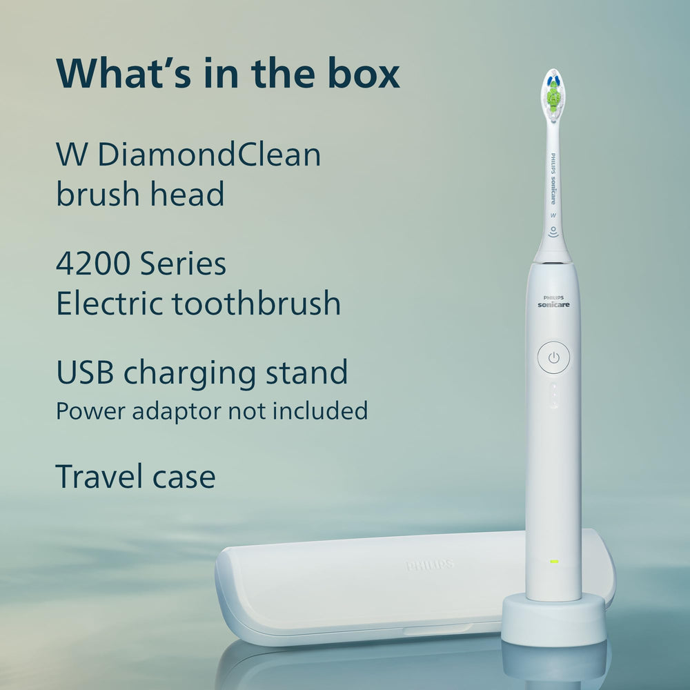 Philips Sonicare comparación de tamaño frente a cepillo manual para escala