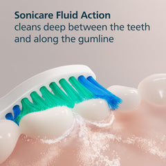 Philips Sonicare cabezal en uso junto al lavabo mostrando limpieza diaria