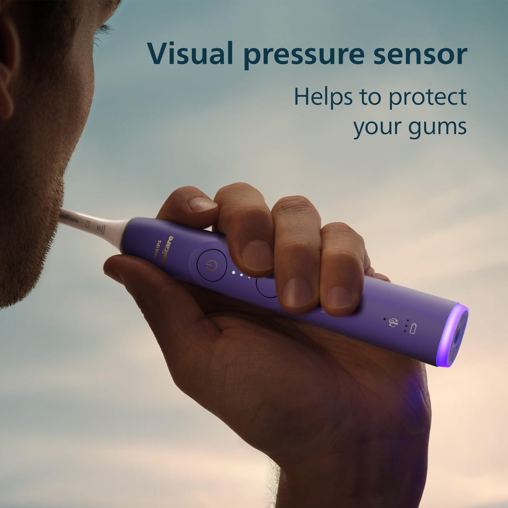 Philips Sonicare cepillando en baño demostrando limpieza en zonas difíciles con suavidad