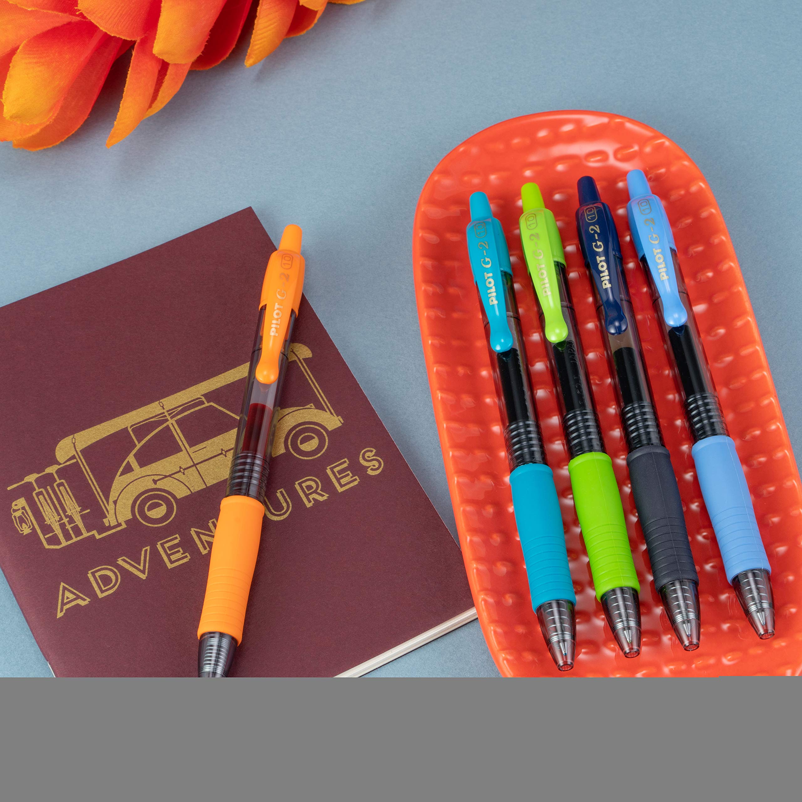 PILOT G2 pen in hand writing on notebook highlighting comfortable control