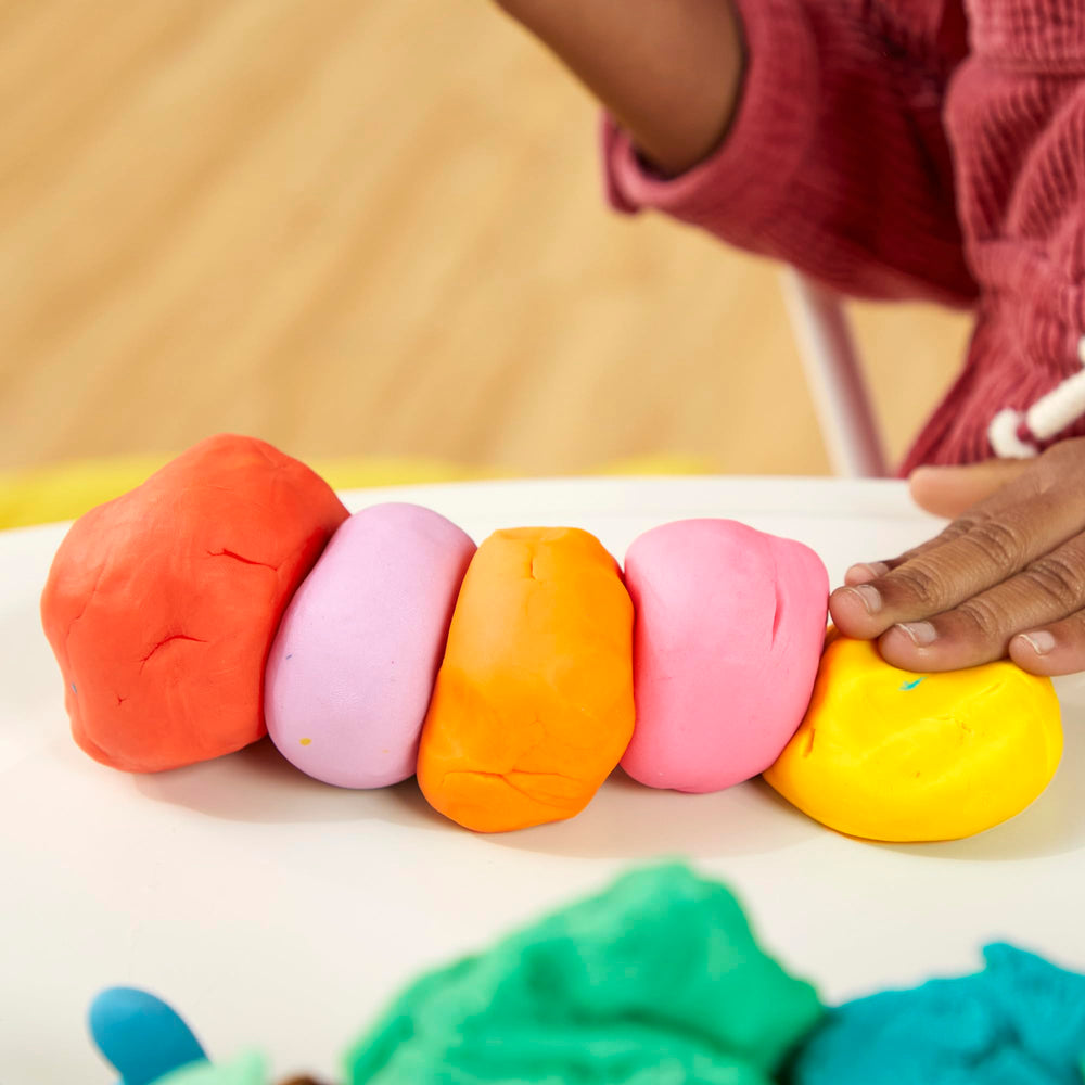 Play‑Doh set arranged for classroom and party use illustrating sharing ease