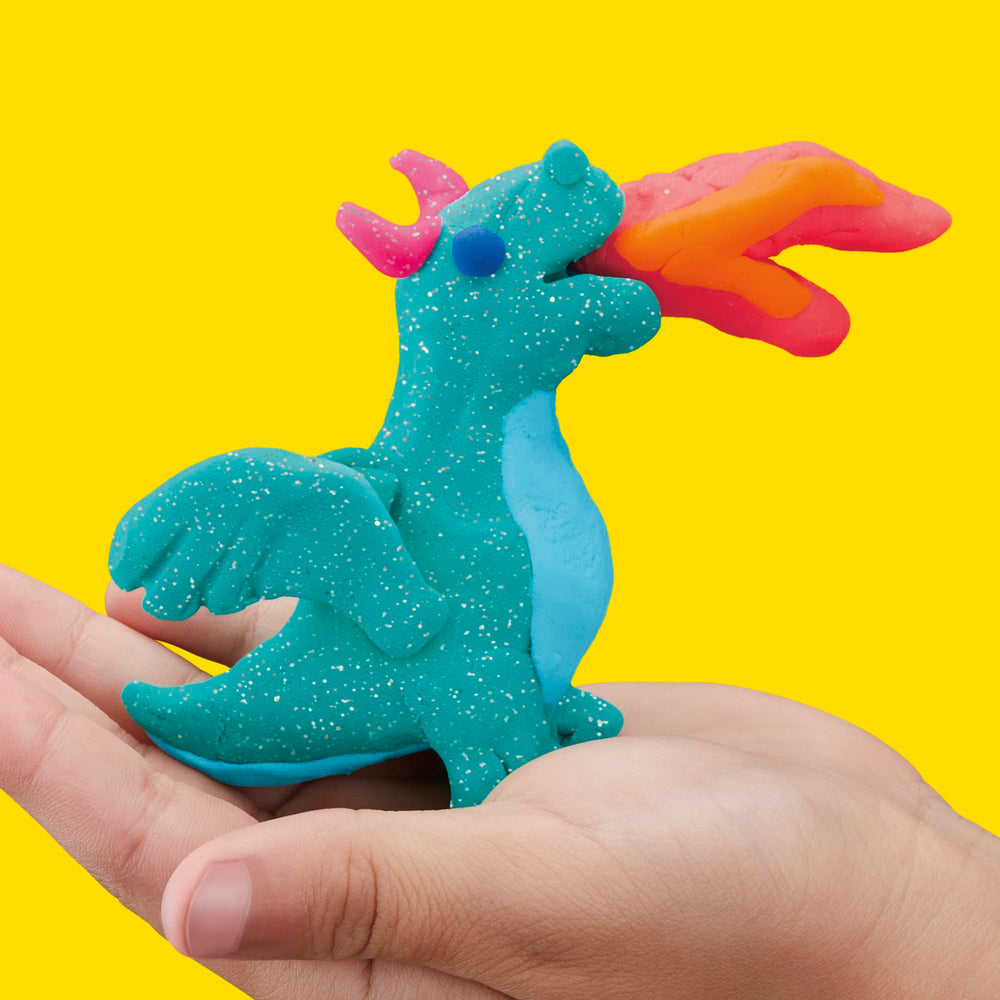 Play‑Doh lata junto a regla para comparar tamaño, práctico para sesiones cortas
