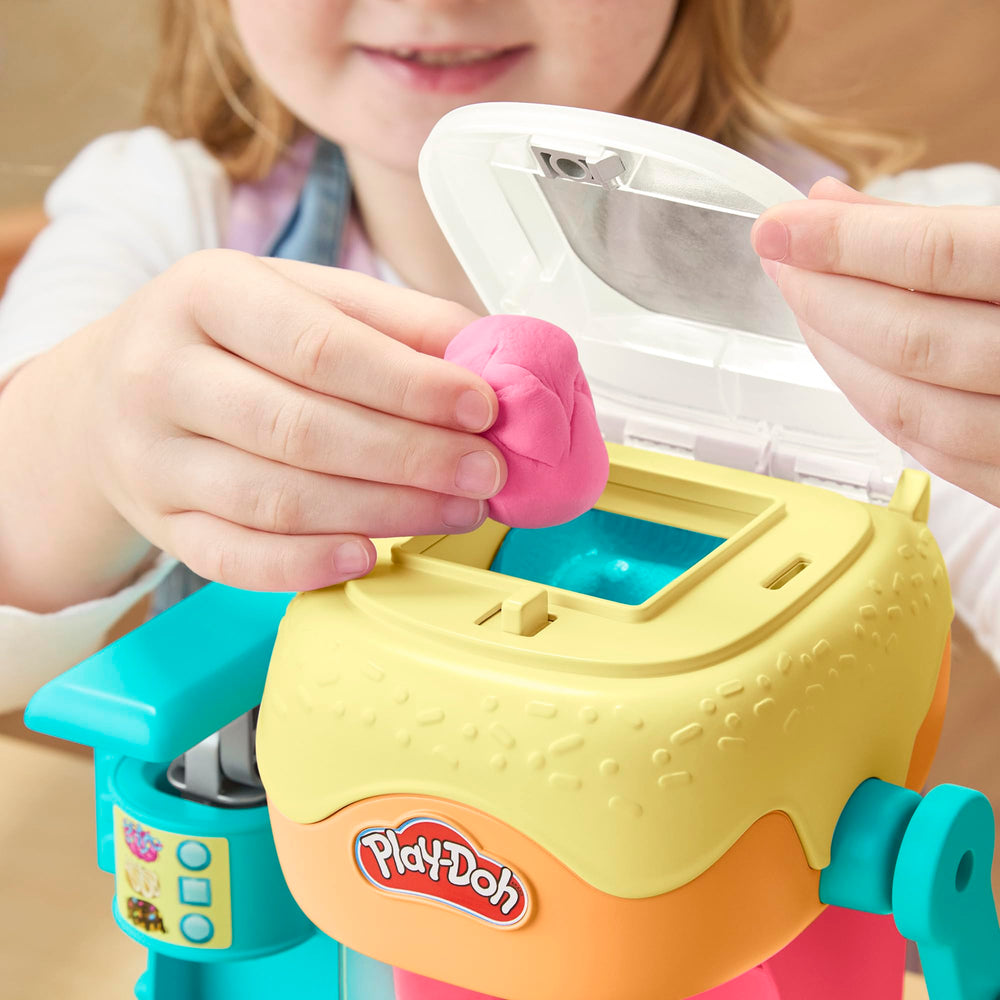 Play‑Doh detalle del molde para donuts mostrando formas, permite crear tres estilos