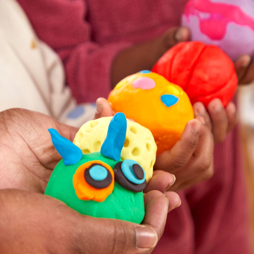 Play‑Doh label and ingredients closeup showing brand details and quality