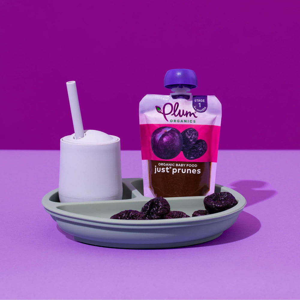 Plum Organics pouch guardado en cambiador de bebé, ideal para salidas
