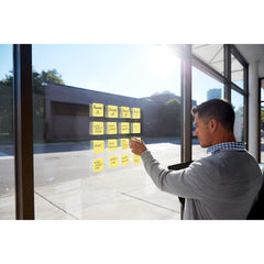 Post-it close-up adhesive edge showing Super Sticky glue benefit: stronger hold