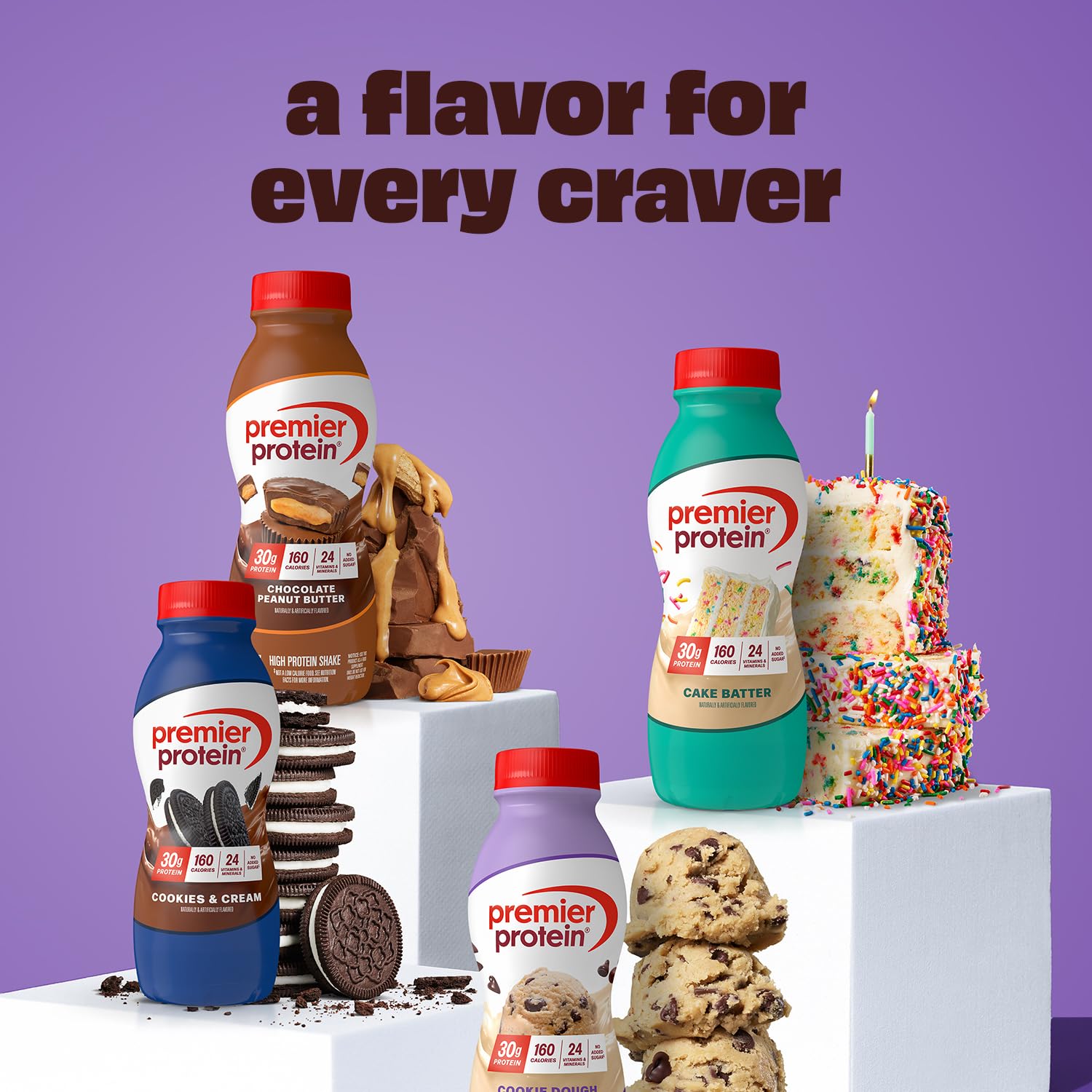 Premier Protein botella Cookie Dough en cocina junto a frutas y libro de recetas