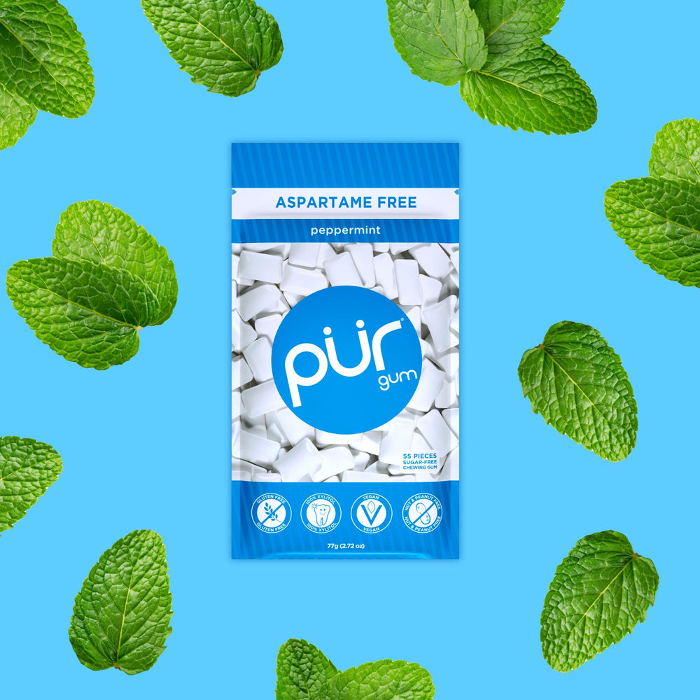 PUR Gum resealable bag open with pieces visible for convenient on-the-go use