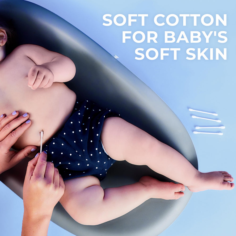 Q-tips gently cleaning baby's navel showing safe, soft care