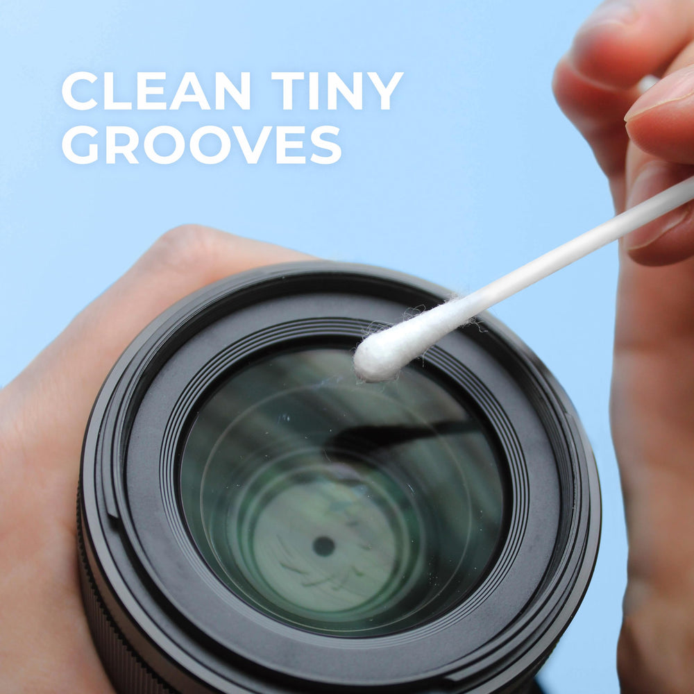 Q-tips removing debris from keyboard offering precise electronics cleaning