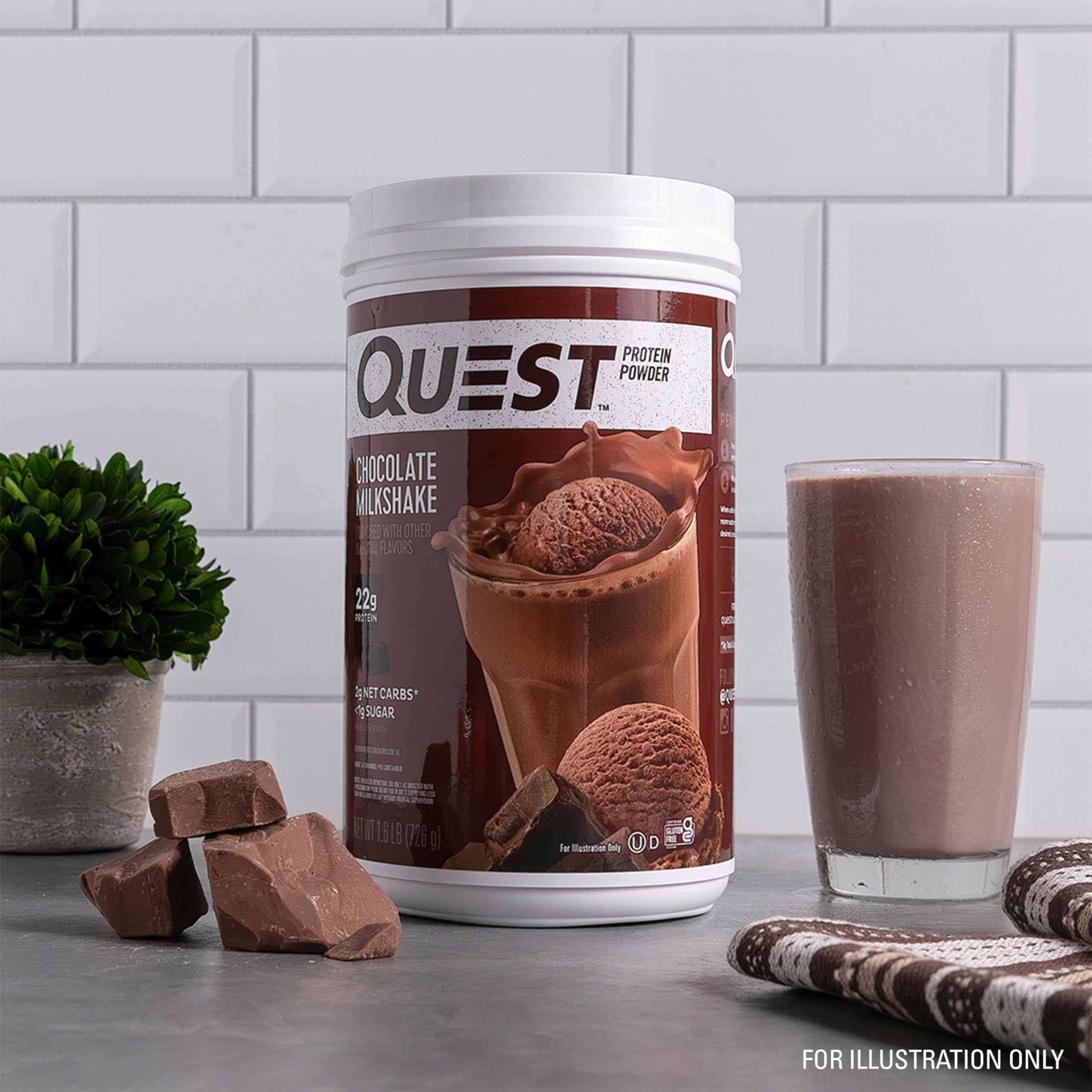 Prepared chocolate shake in a glass made with Quest providing a satisfying treat