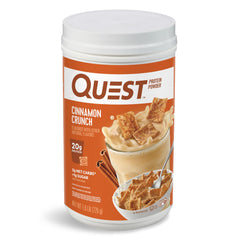 Quest bote frontal con etiqueta, muestra sabor cinnamon crunch y ventaja de bajo carbohidrato