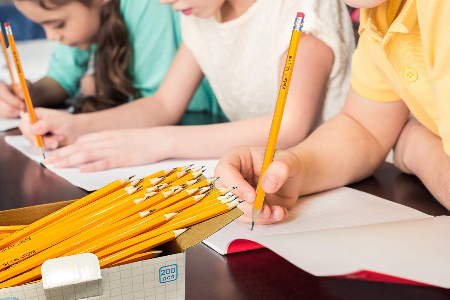 Rarlan classroom distribution lifestyle with teacher handing pencils, efficient supply