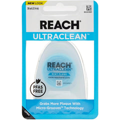 REACH empaque frontal mostrando hilo dental y beneficio limpieza eficaz