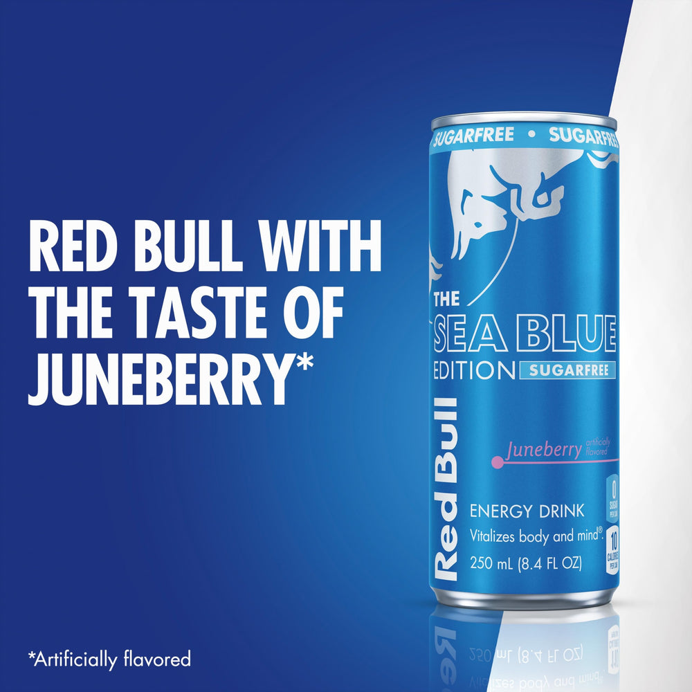 Red Bull Sea Blue lata junto a contenedor de reciclaje, aluminio reusable