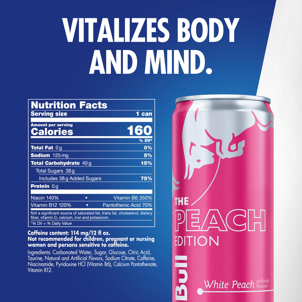 Red Bull White Peach lata abierta mostrando bebida ligeramente carbonatada